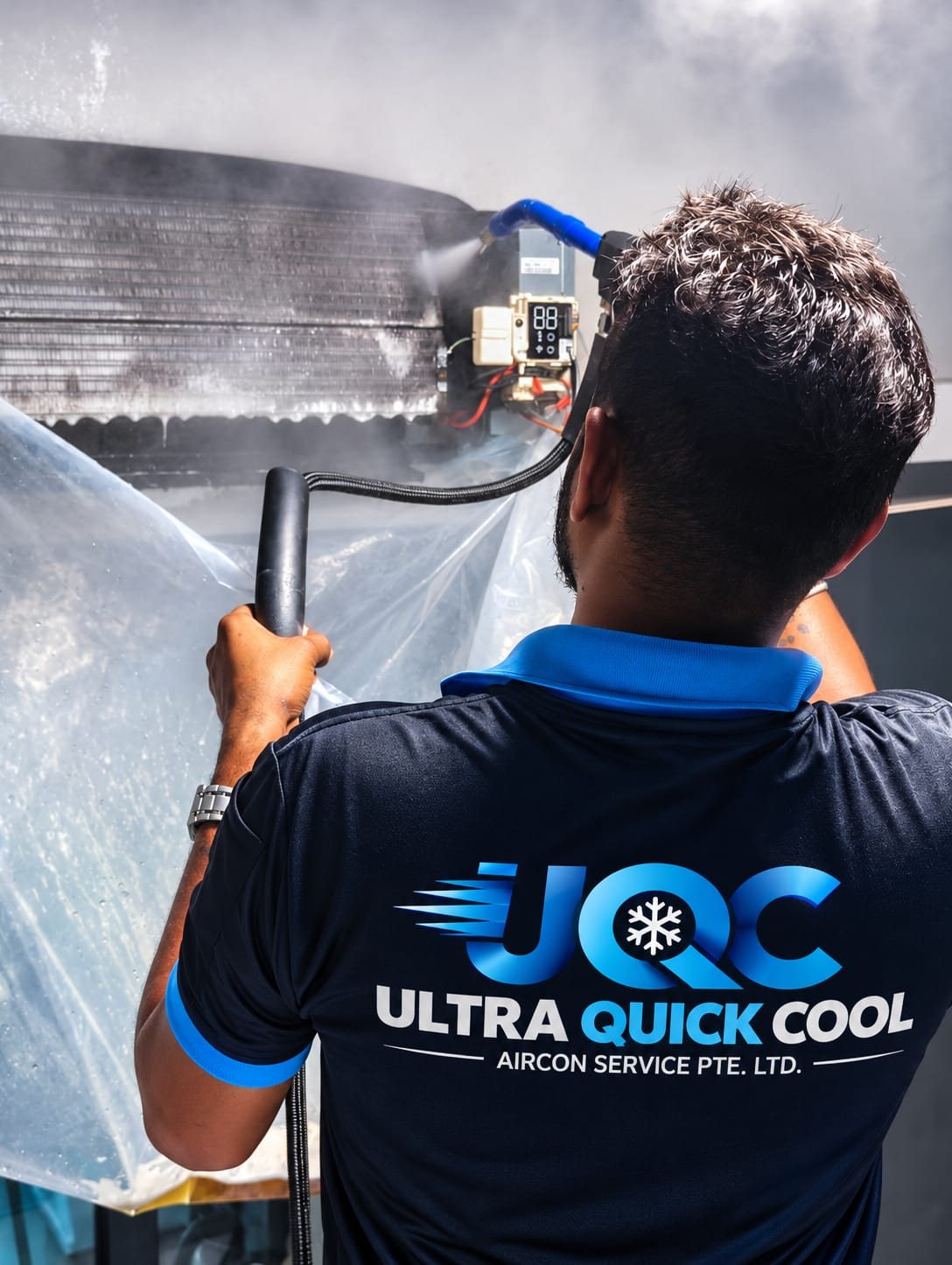 Ultra Quick Cool technician cleaning an aircon unit